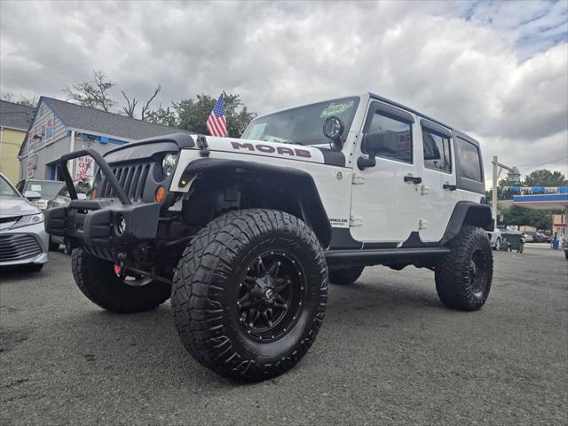 used 2013 Jeep Wrangler Unlimited car, priced at $17,999