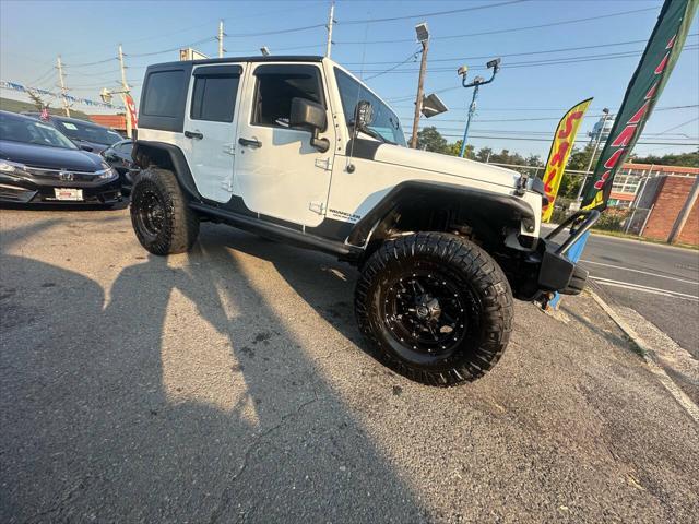 used 2013 Jeep Wrangler Unlimited car, priced at $17,999