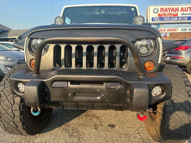 used 2013 Jeep Wrangler Unlimited car, priced at $17,999