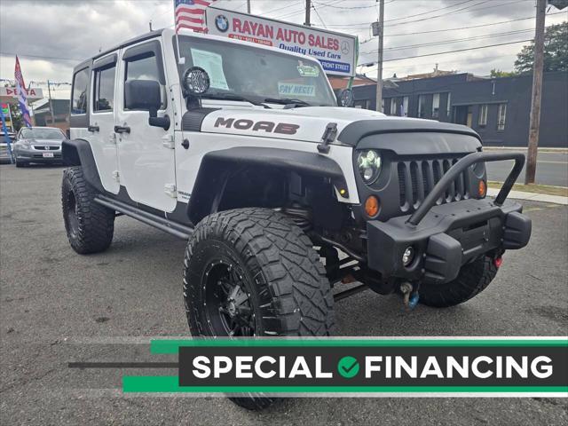 used 2013 Jeep Wrangler Unlimited car, priced at $17,999