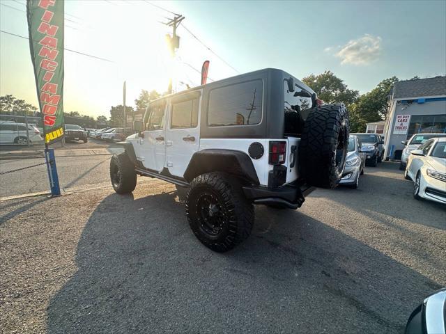 used 2013 Jeep Wrangler Unlimited car, priced at $17,999