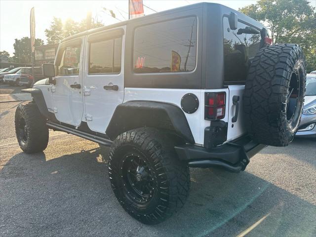 used 2013 Jeep Wrangler Unlimited car, priced at $17,999