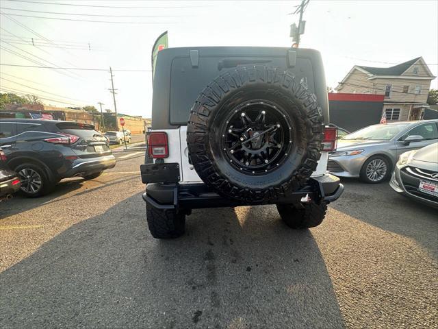 used 2013 Jeep Wrangler Unlimited car, priced at $17,999