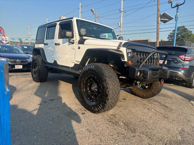 used 2013 Jeep Wrangler Unlimited car, priced at $17,999