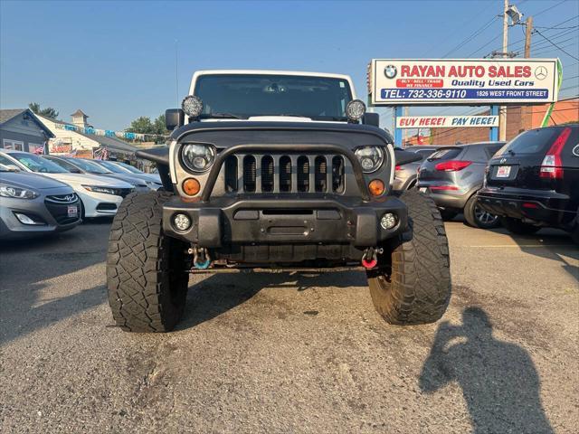 used 2013 Jeep Wrangler Unlimited car, priced at $17,999