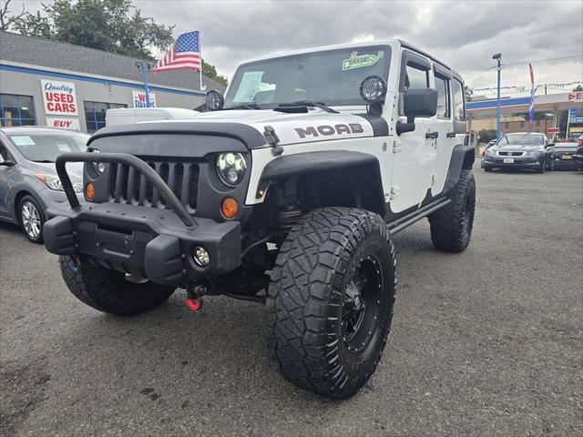 used 2013 Jeep Wrangler Unlimited car, priced at $17,999