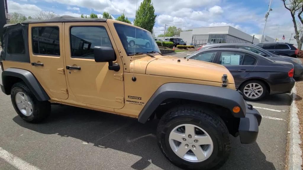 used 2013 Jeep Wrangler Unlimited car, priced at $18,999