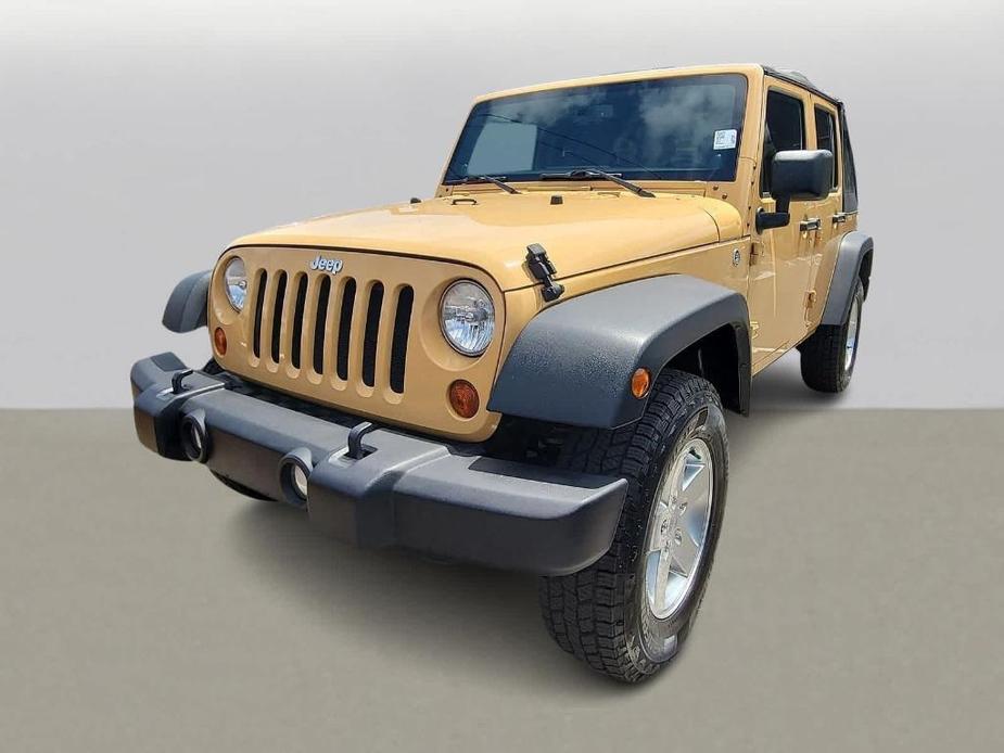 used 2013 Jeep Wrangler Unlimited car, priced at $19,799