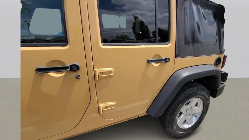 used 2013 Jeep Wrangler Unlimited car, priced at $17,496