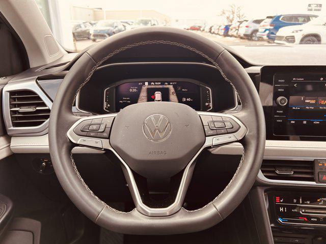 used 2025 Volkswagen Taos car, priced at $29,595