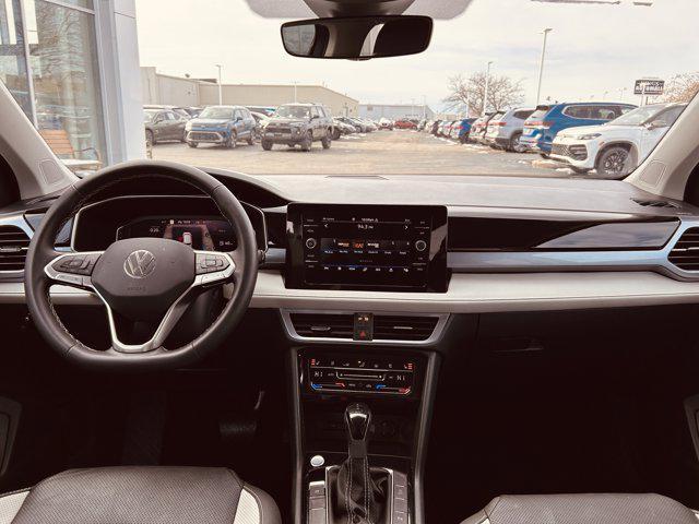 used 2025 Volkswagen Taos car, priced at $29,595