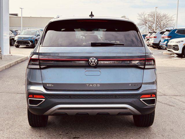 used 2025 Volkswagen Taos car, priced at $29,595