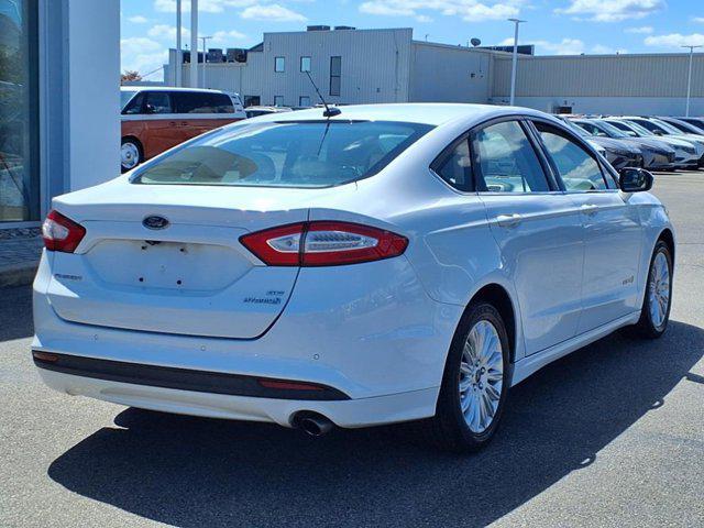 used 2016 Ford Fusion Hybrid car, priced at $9,000