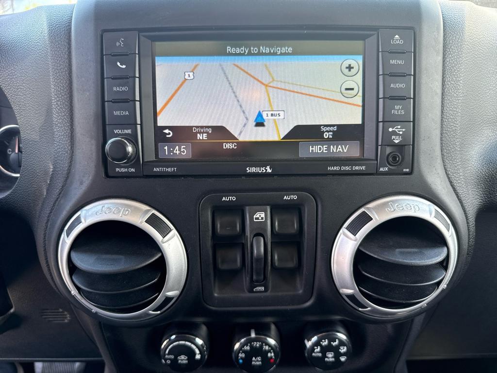 used 2014 Jeep Wrangler Unlimited car, priced at $18,995