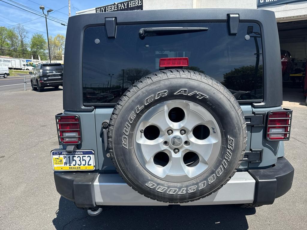 used 2014 Jeep Wrangler Unlimited car, priced at $18,995