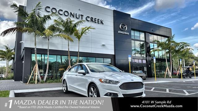 used 2016 Ford Fusion car, priced at $13,129