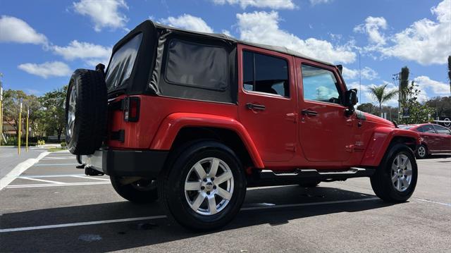 used 2013 Jeep Wrangler Unlimited car, priced at $17,680