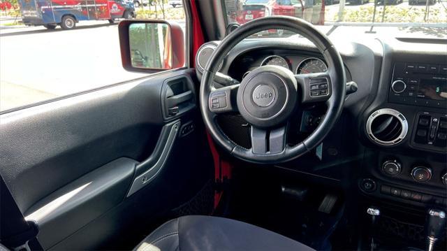 used 2013 Jeep Wrangler Unlimited car, priced at $17,680