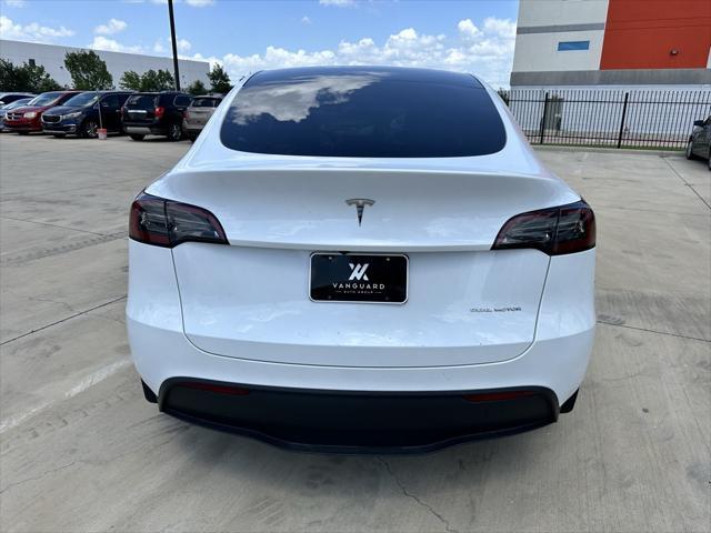 used 2024 Tesla Model Y car, priced at $34,666