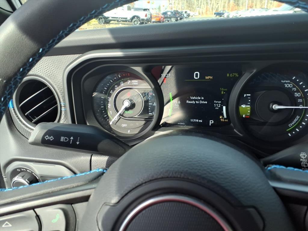 used 2024 Jeep Wrangler 4xe car, priced at $49,900