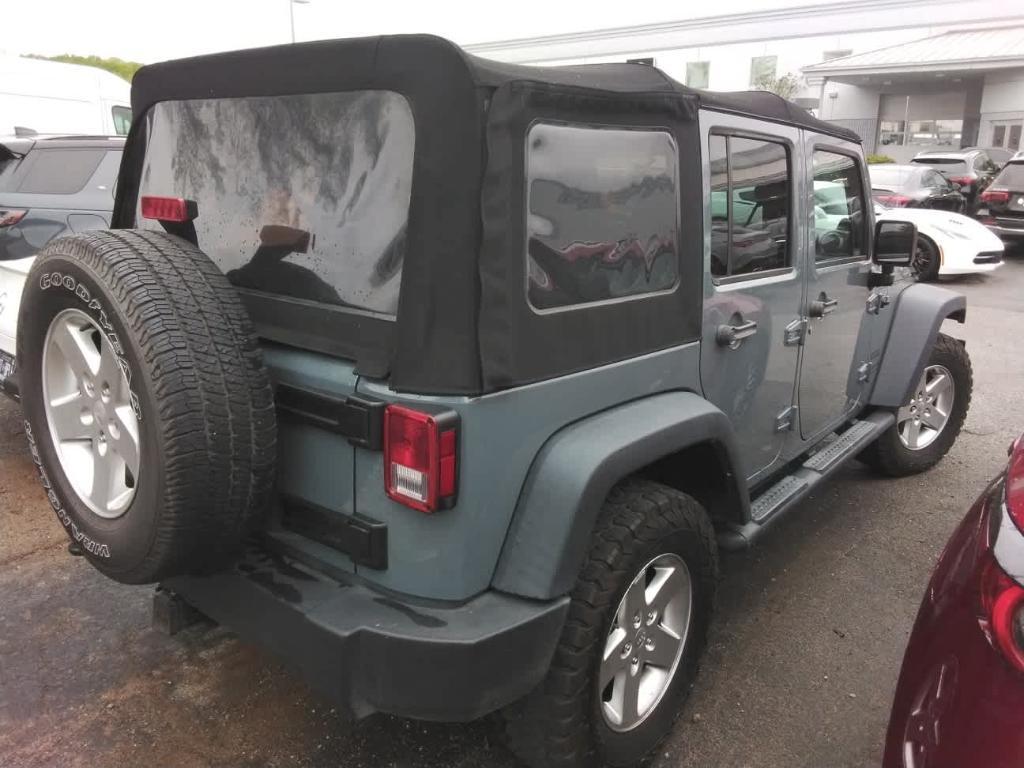 used 2014 Jeep Wrangler Unlimited car, priced at $21,990