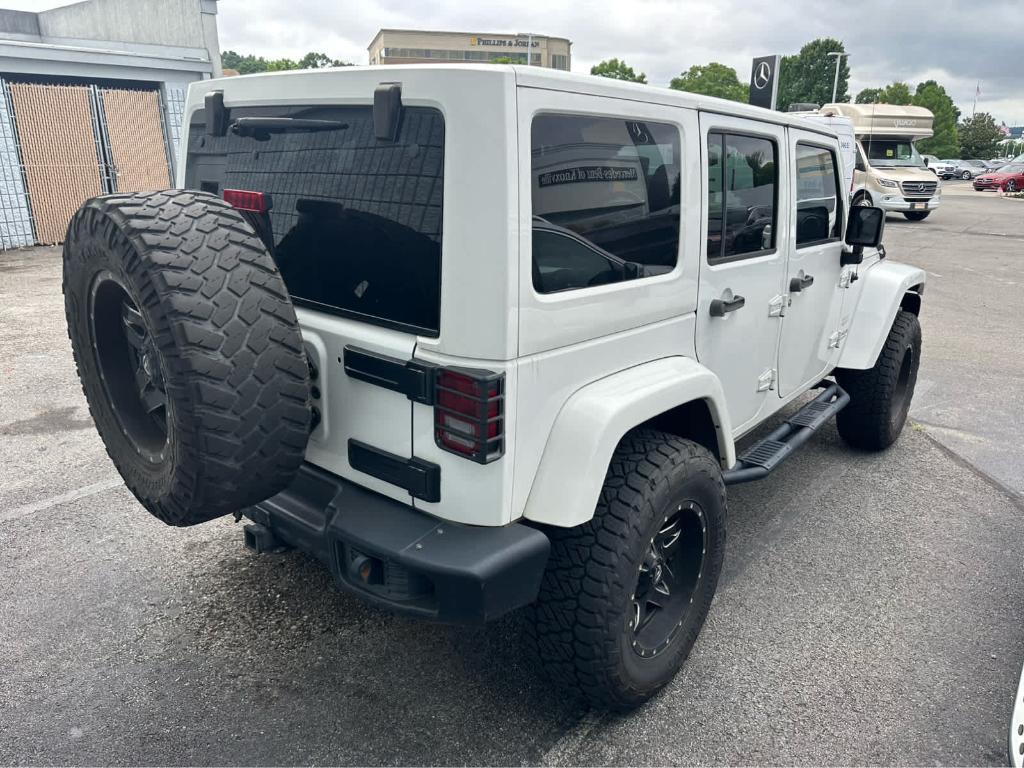 used 2014 Jeep Wrangler Unlimited car, priced at $18,993