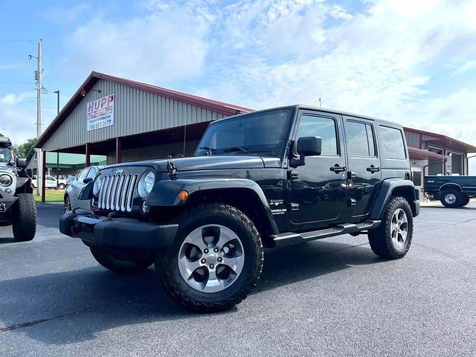 used 2016 Jeep Wrangler Unlimited car, priced at $18,269