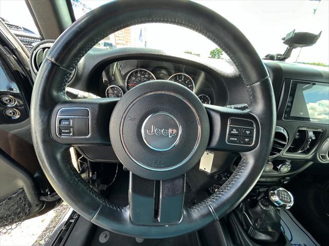 used 2015 Jeep Wrangler Unlimited car, priced at $23,995