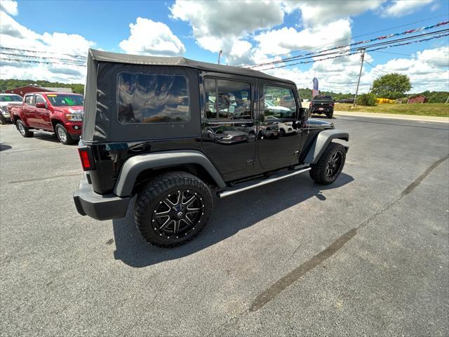 used 2015 Jeep Wrangler Unlimited car, priced at $23,995