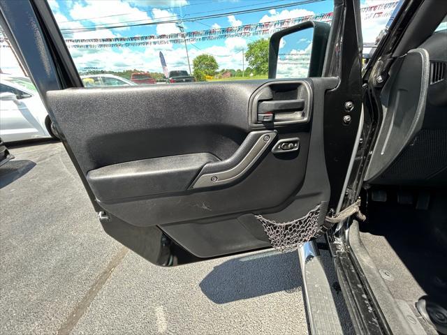 used 2015 Jeep Wrangler Unlimited car, priced at $23,995