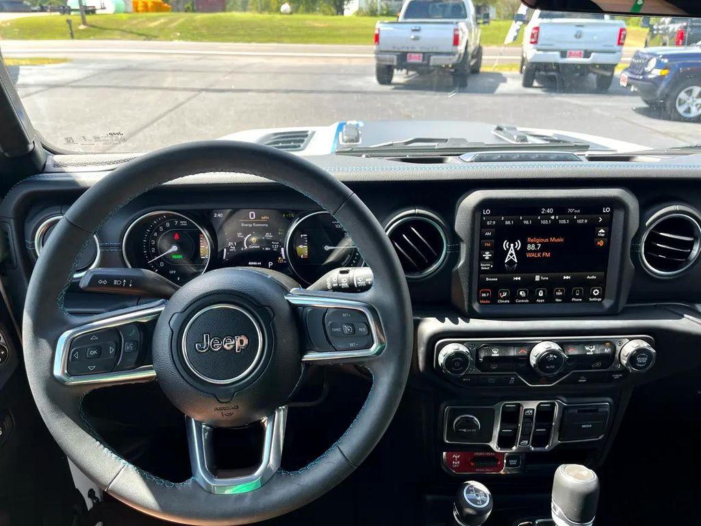 used 2023 Jeep Wrangler 4xe car, priced at $39,134