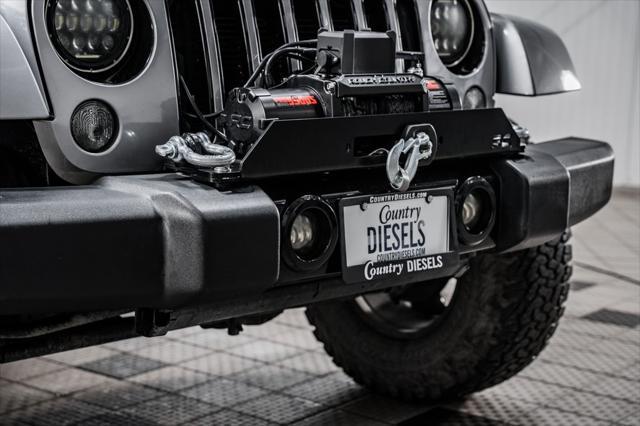 used 2015 Jeep Wrangler Unlimited car, priced at $18,990