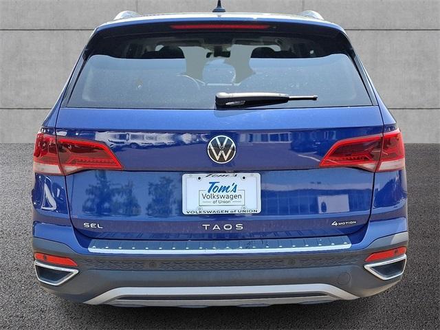 used 2022 Volkswagen Taos car, priced at $23,777