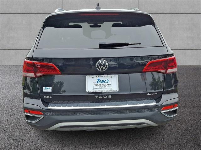 used 2022 Volkswagen Taos car, priced at $23,997
