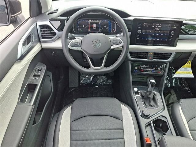 new 2025 Volkswagen Taos car, priced at $37,326