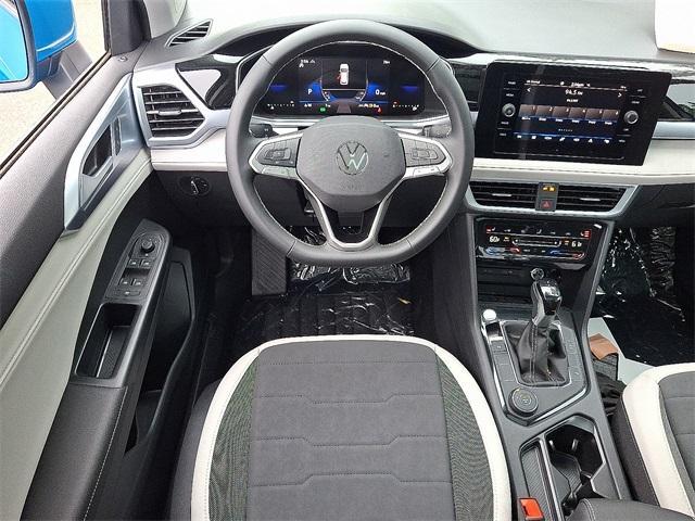 new 2025 Volkswagen Taos car, priced at $32,856