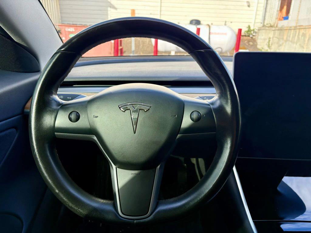 used 2018 Tesla Model 3 car, priced at $16,499