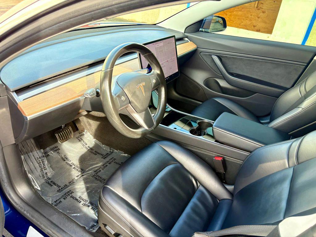 used 2018 Tesla Model 3 car, priced at $16,499