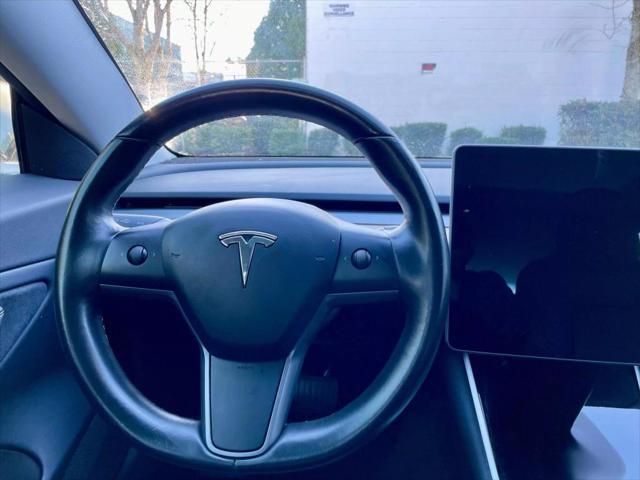 used 2018 Tesla Model 3 car, priced at $19,499