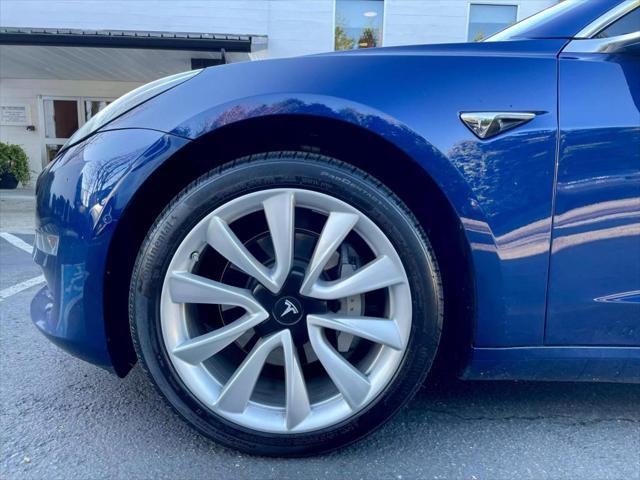 used 2018 Tesla Model 3 car, priced at $19,499