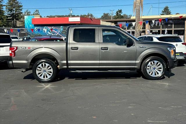 used 2018 Ford F-150 car, priced at $23,580