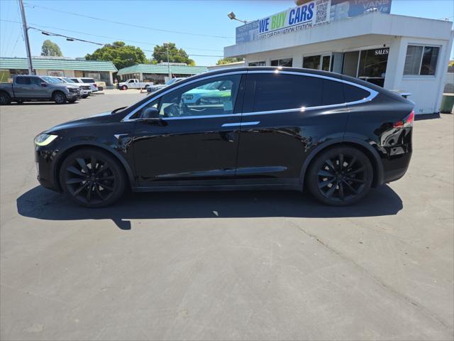 used 2018 Tesla Model X car, priced at $31,950