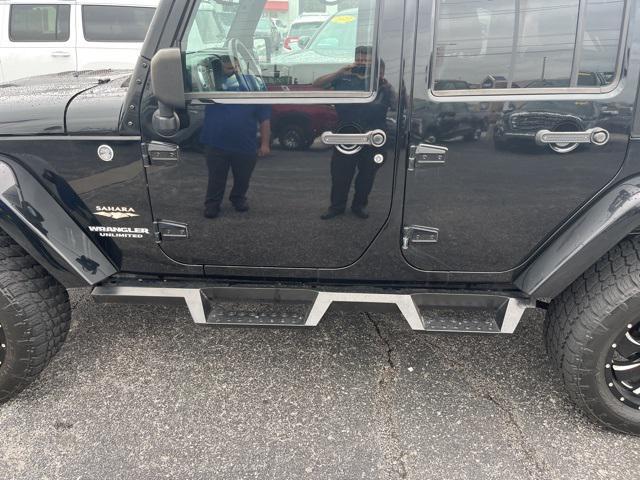 used 2013 Jeep Wrangler Unlimited car, priced at $18,959