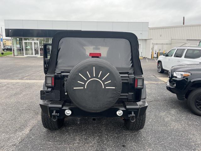used 2013 Jeep Wrangler Unlimited car, priced at $18,959