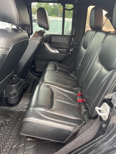 used 2013 Jeep Wrangler Unlimited car, priced at $18,959