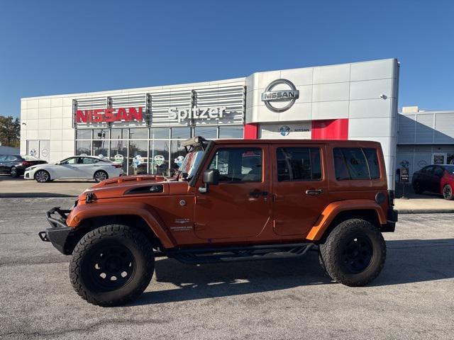 used 2011 Jeep Wrangler Unlimited car, priced at $11,483