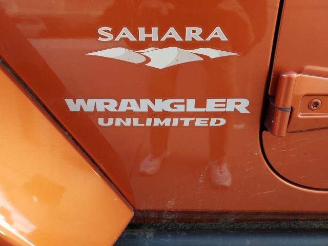 used 2011 Jeep Wrangler Unlimited car, priced at $11,483