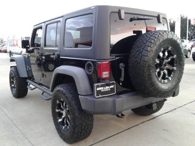 used 2015 Jeep Wrangler Unlimited car, priced at $21,413