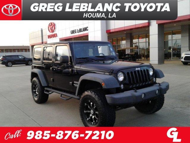 used 2015 Jeep Wrangler Unlimited car, priced at $21,413