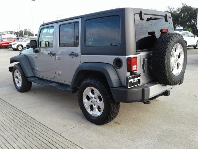 used 2013 Jeep Wrangler Unlimited car, priced at $19,556